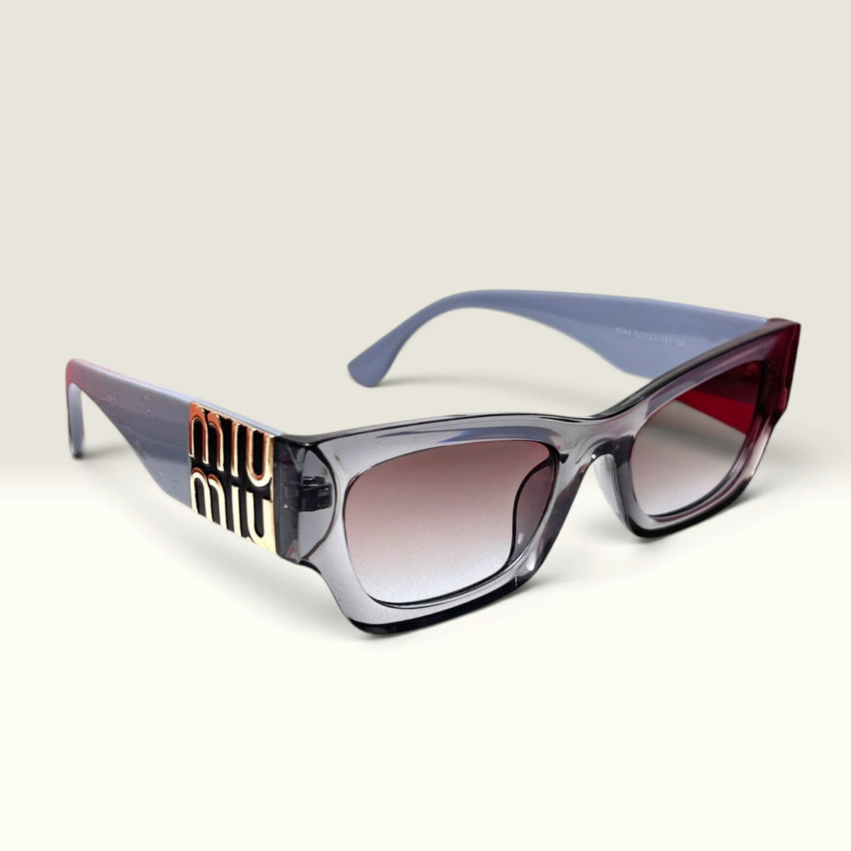 Miu Miu MU B04S Irregular Sunglasses Grey Crystal