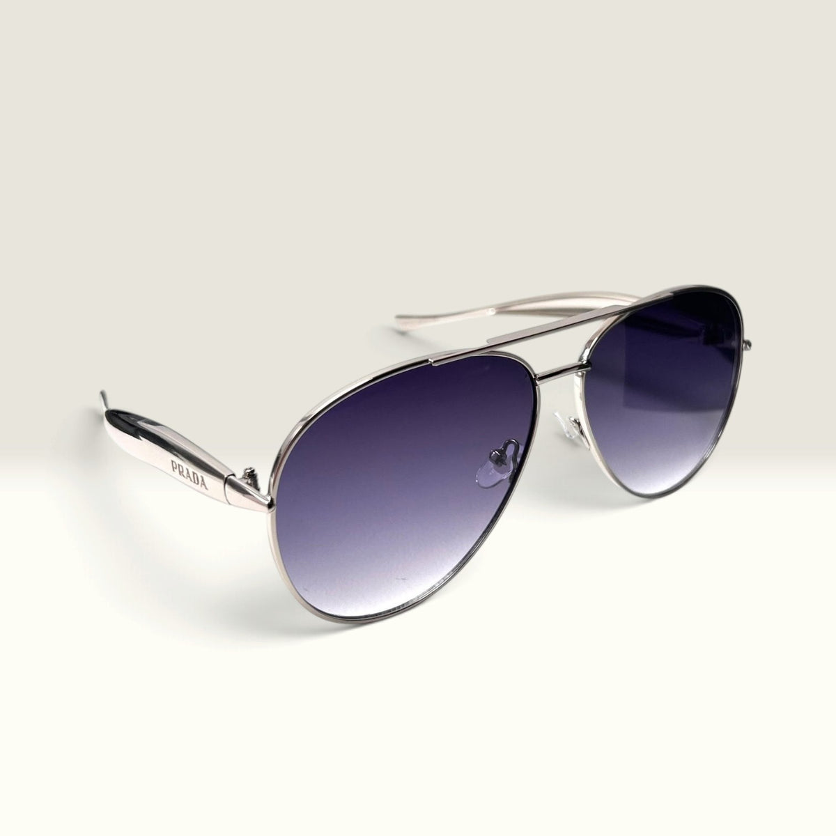 Prada PR 54ZS  Silver Light Gunmetal frame with Gray-Blue Gradient