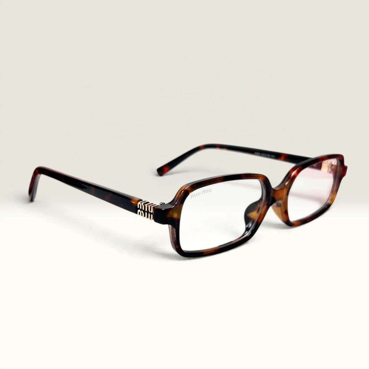 Miu Miu "Miu Regard" Rectangular Honey Havana transparent