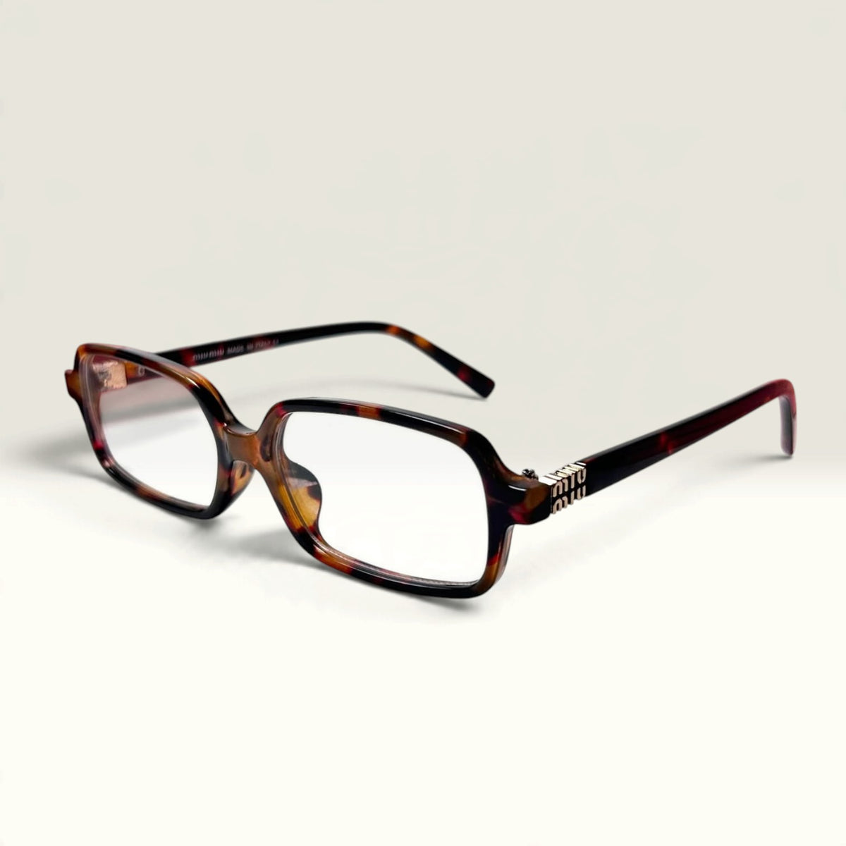 Miu Miu "Miu Regard" Rectangular Honey Havana transparent