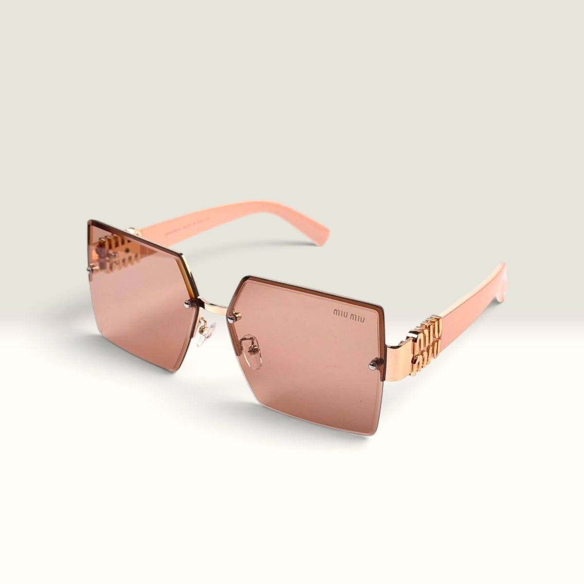 MIU MIU  RIMLESS OVERSIZED SQUARE  ROSE GOLD NUDE